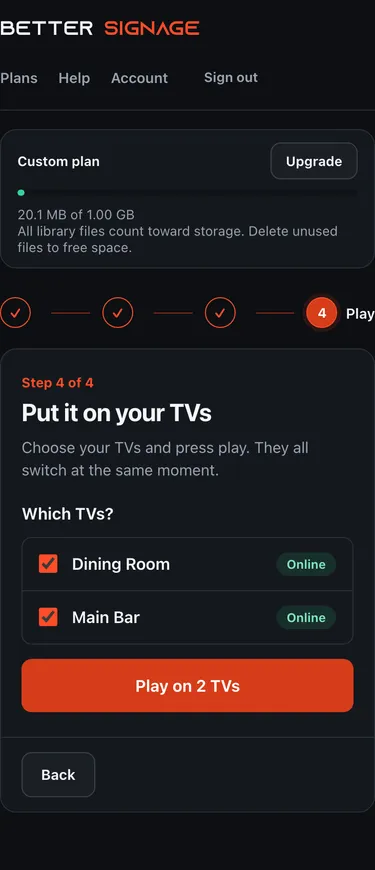 Better Signage customer Play step with two sample paired TVs selected and showing Online status.
